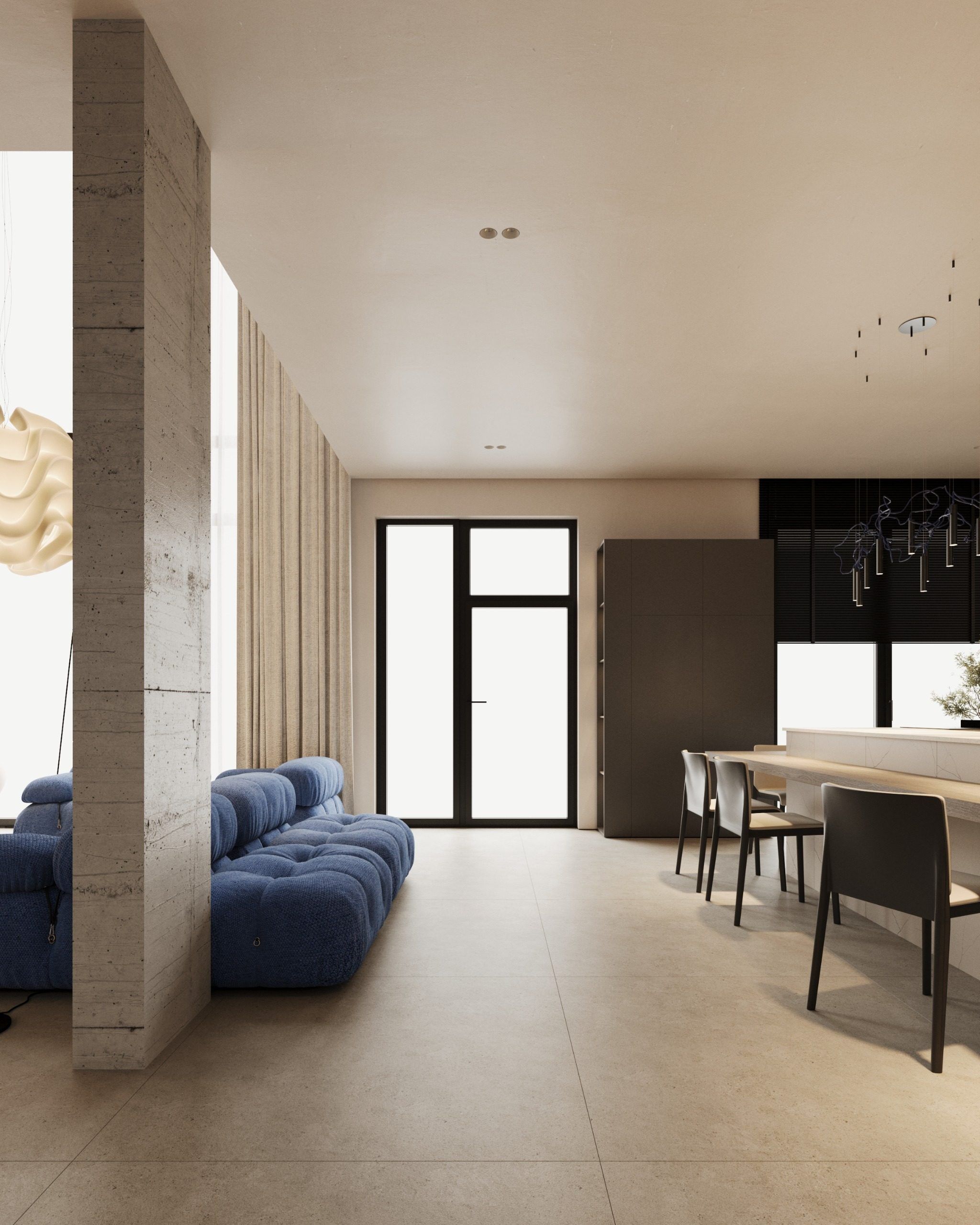 Open space with blue sofa and dining area
