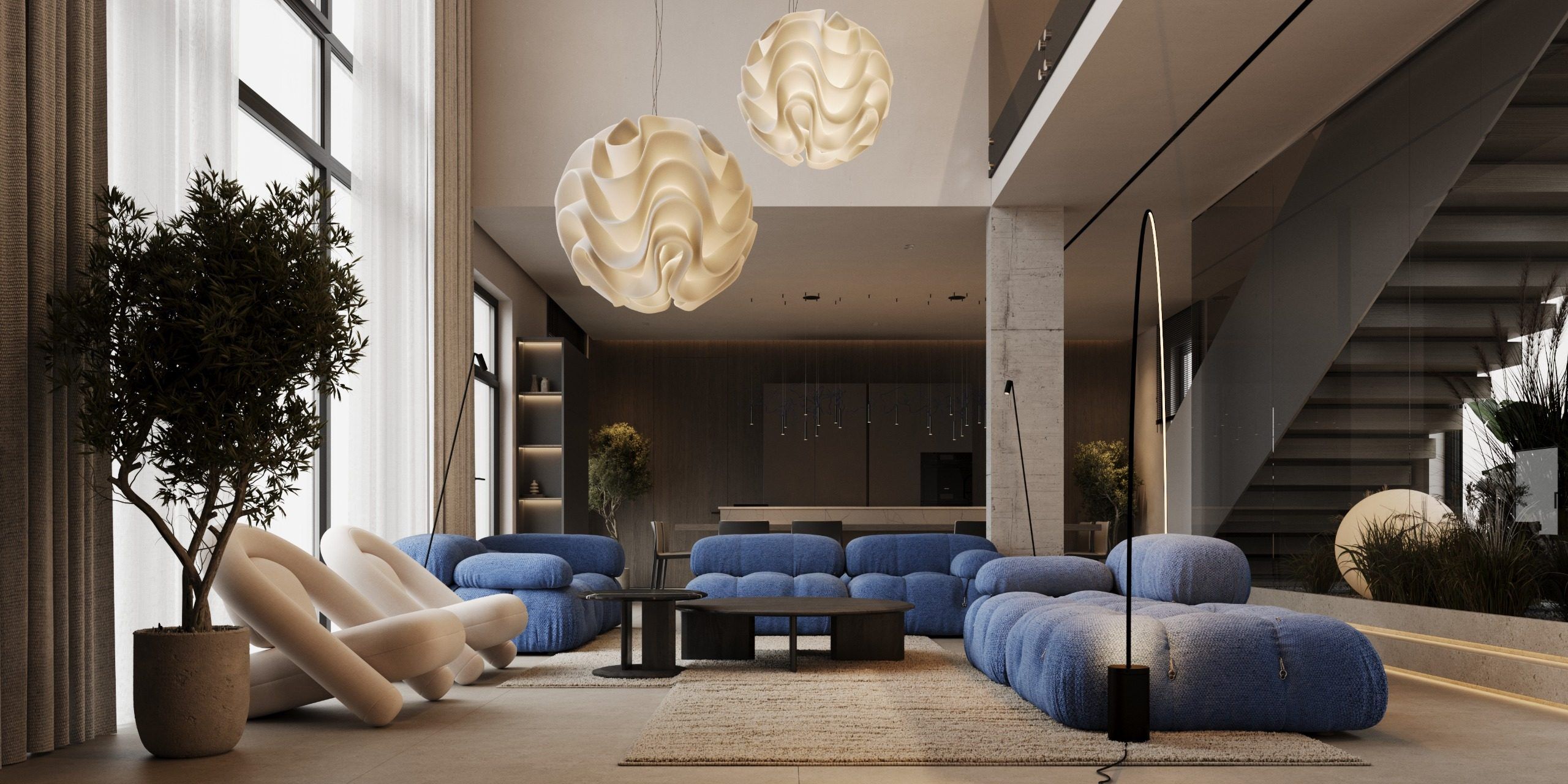 Living room with blue modular sofas and suspended pendant lights