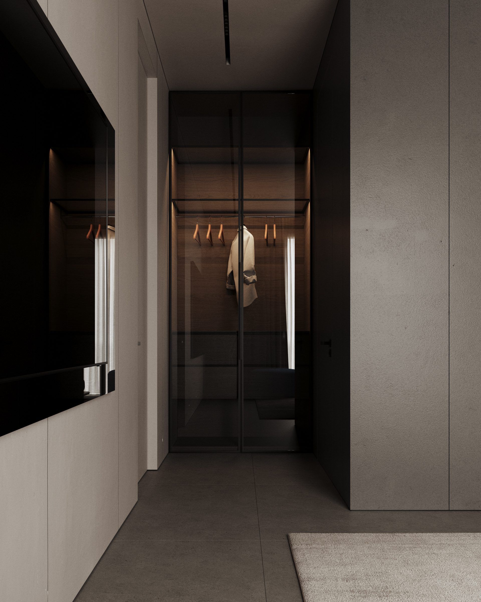 Walk-in wardrobe with lighting and hanging garments