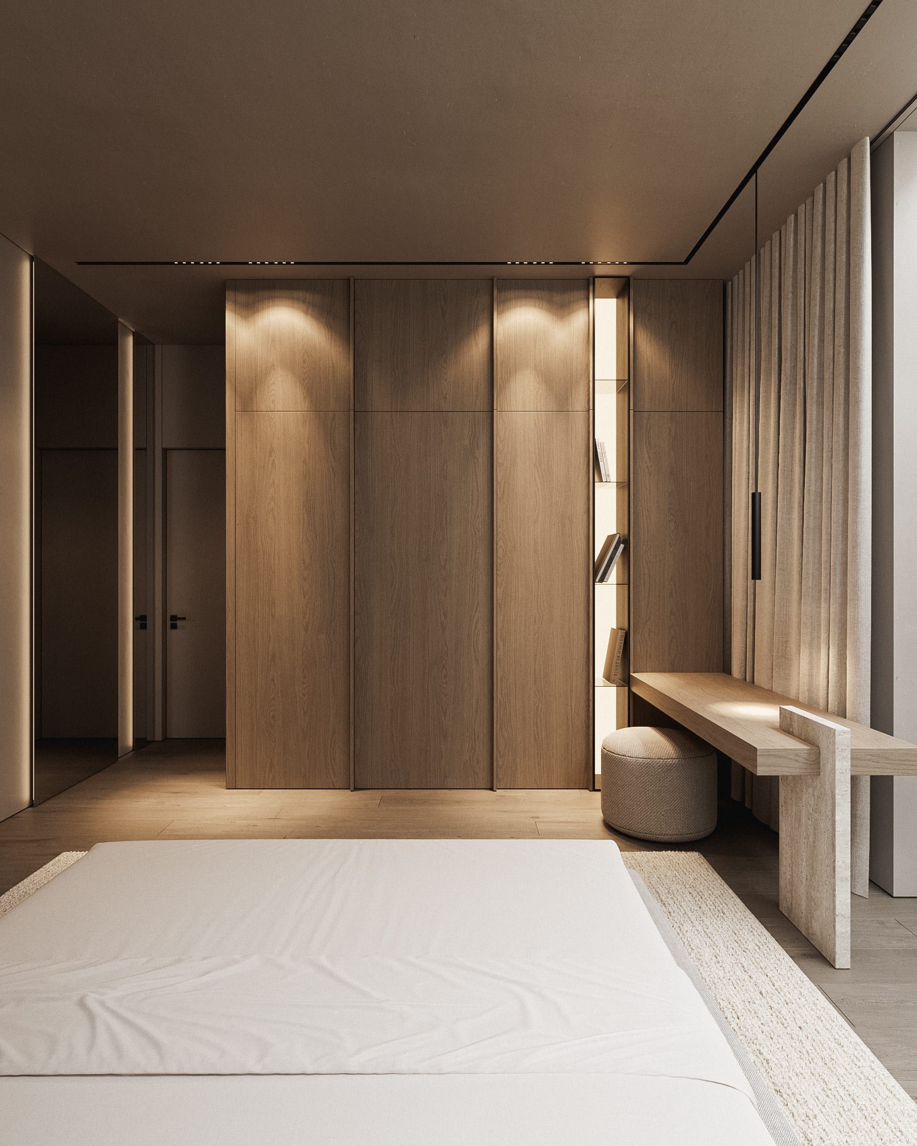 Hallway with wooden doors, integrated lighting and neutral palette