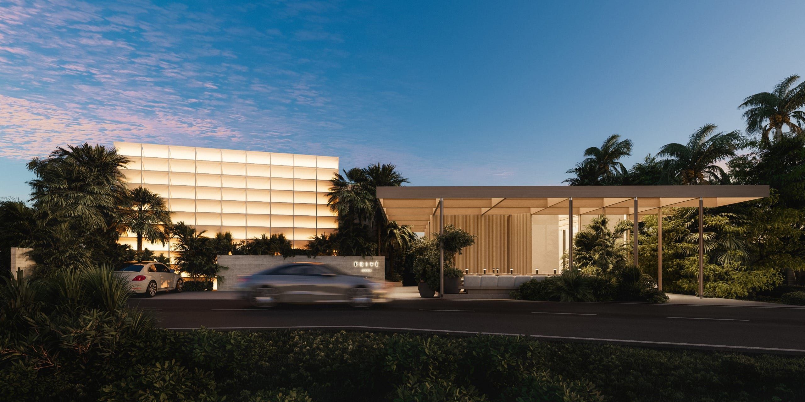 Residence facade with latticed glazing and palms at dusk