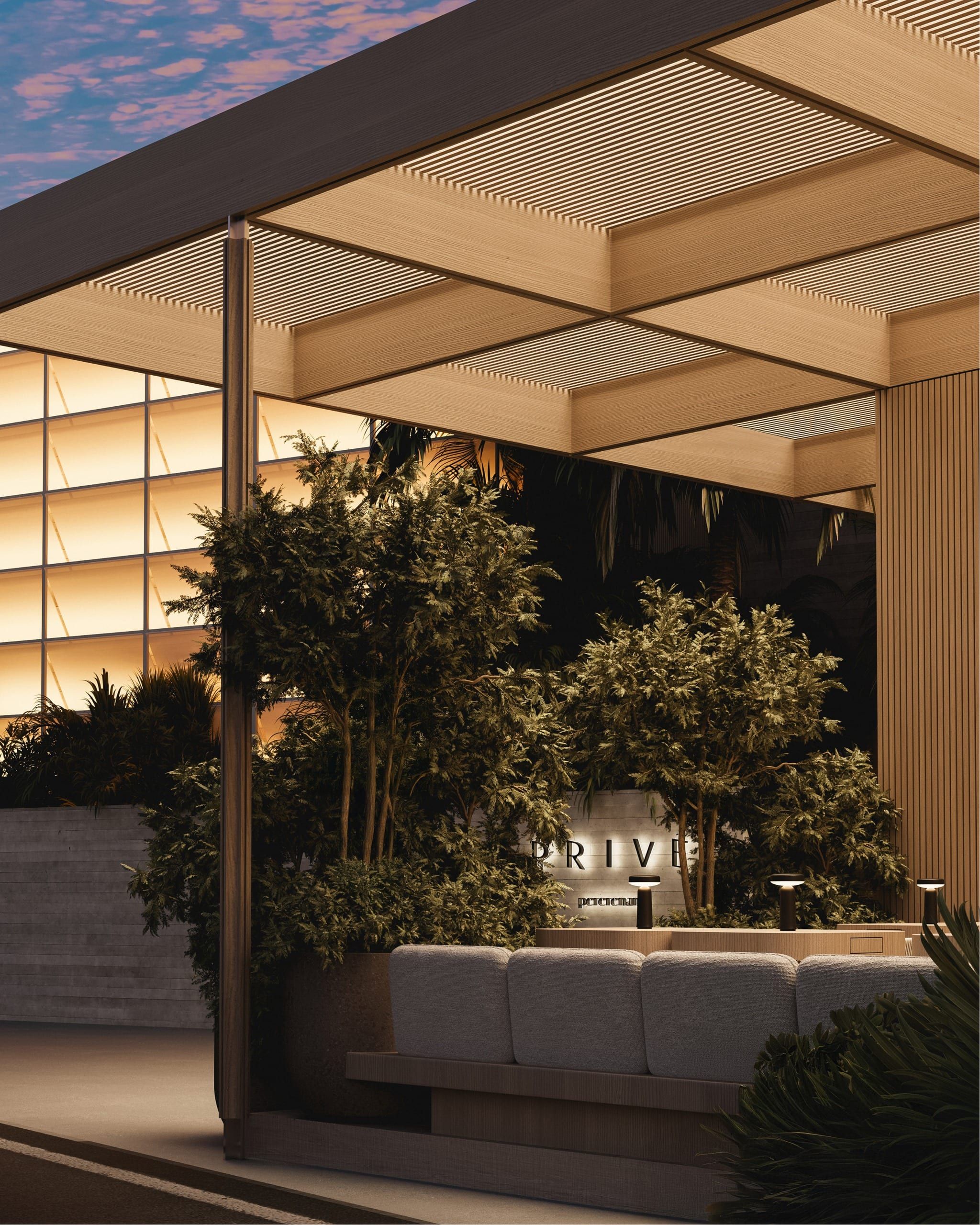 Green lounge area under canopy with contemporary furnishings