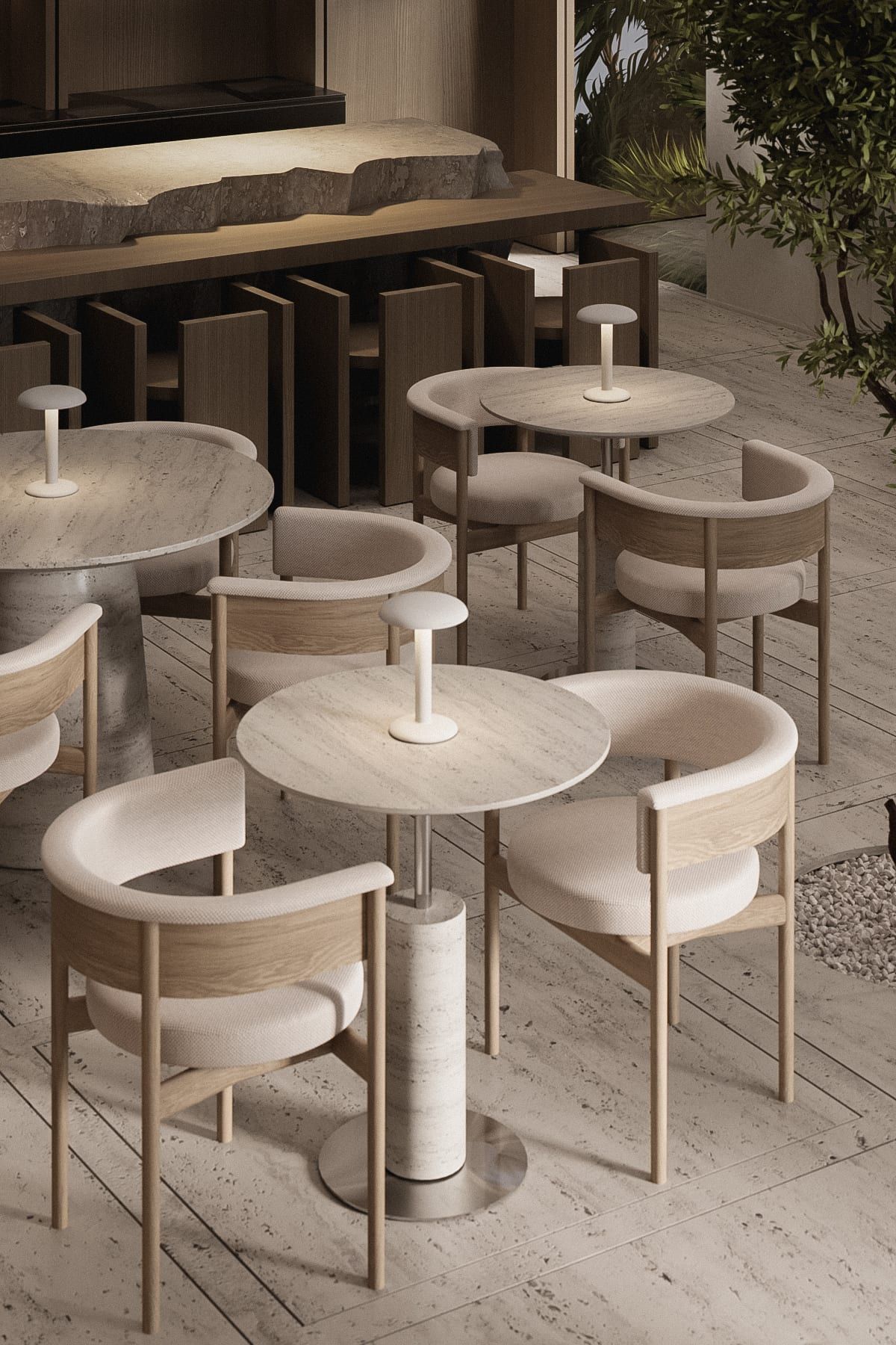 Dining area with marble tables and oak chairs