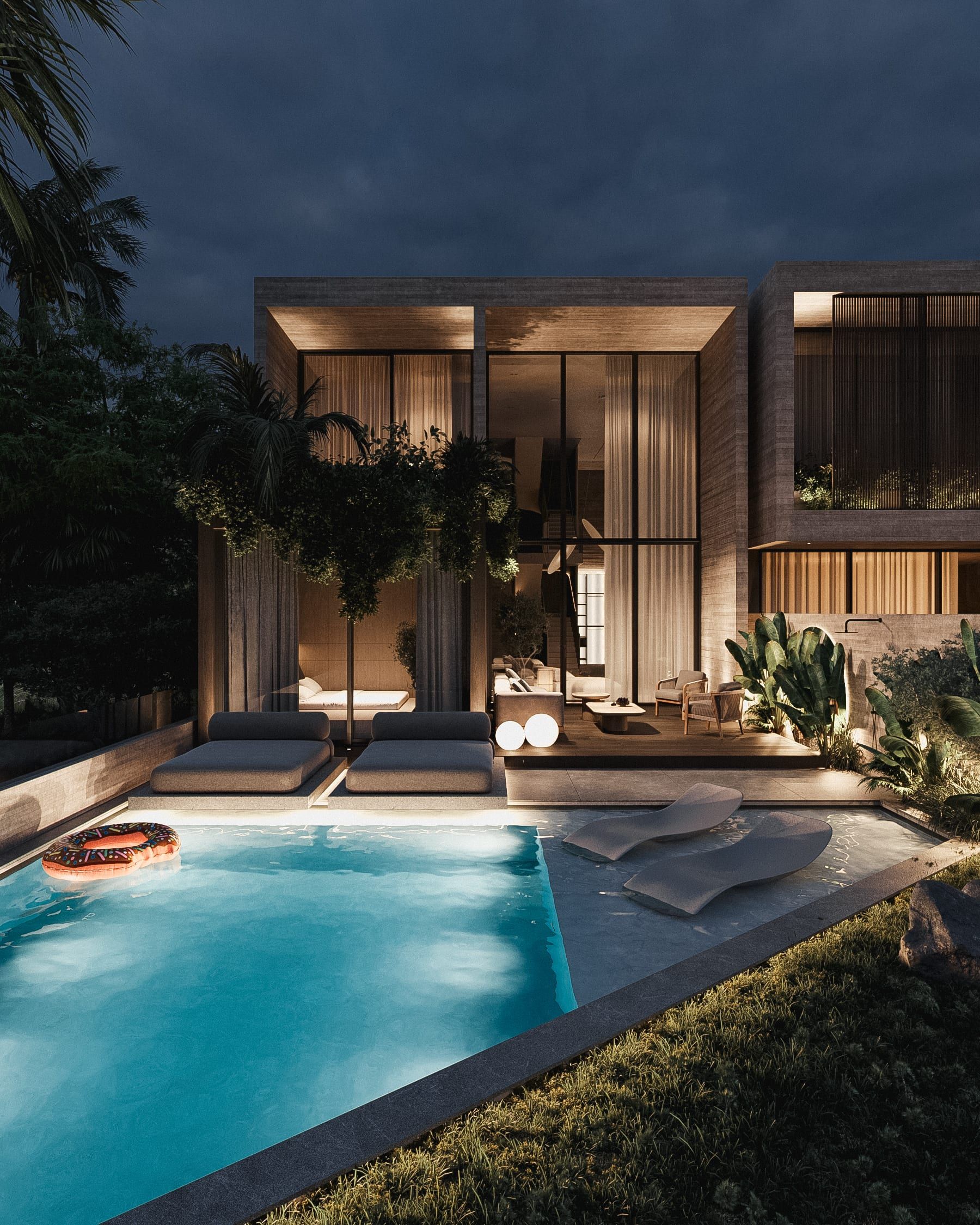 Illuminated house with pool and plantings at dusk