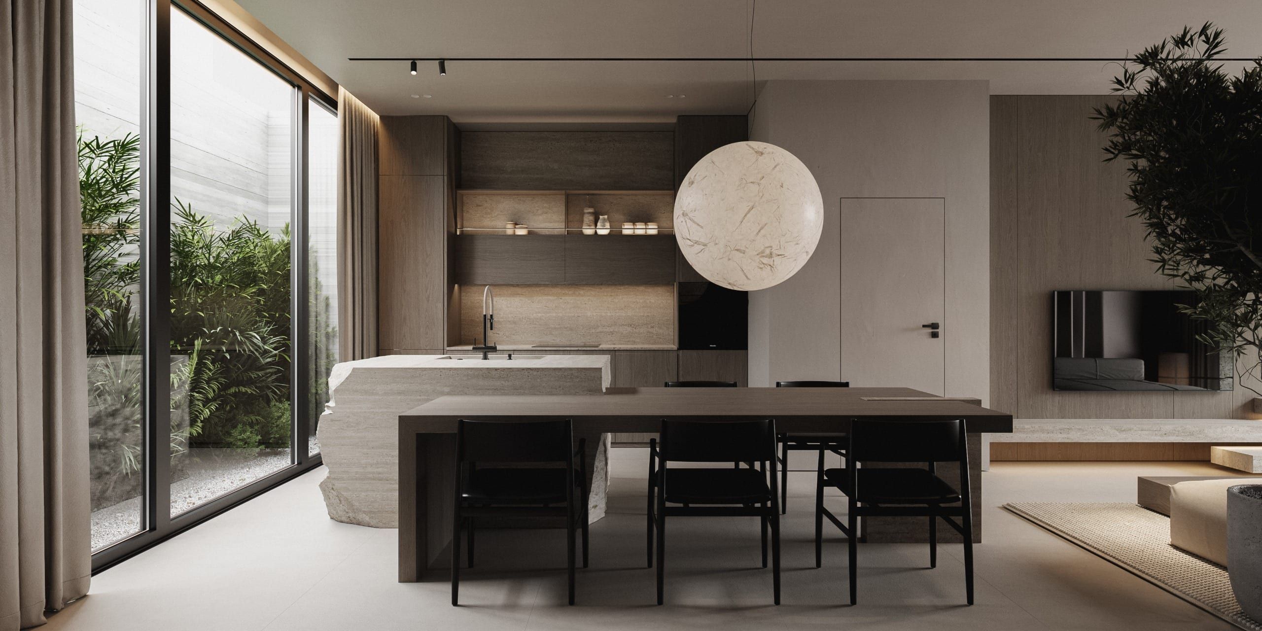 Dining room with black chairs, dining table and floor-to-ceiling glazing