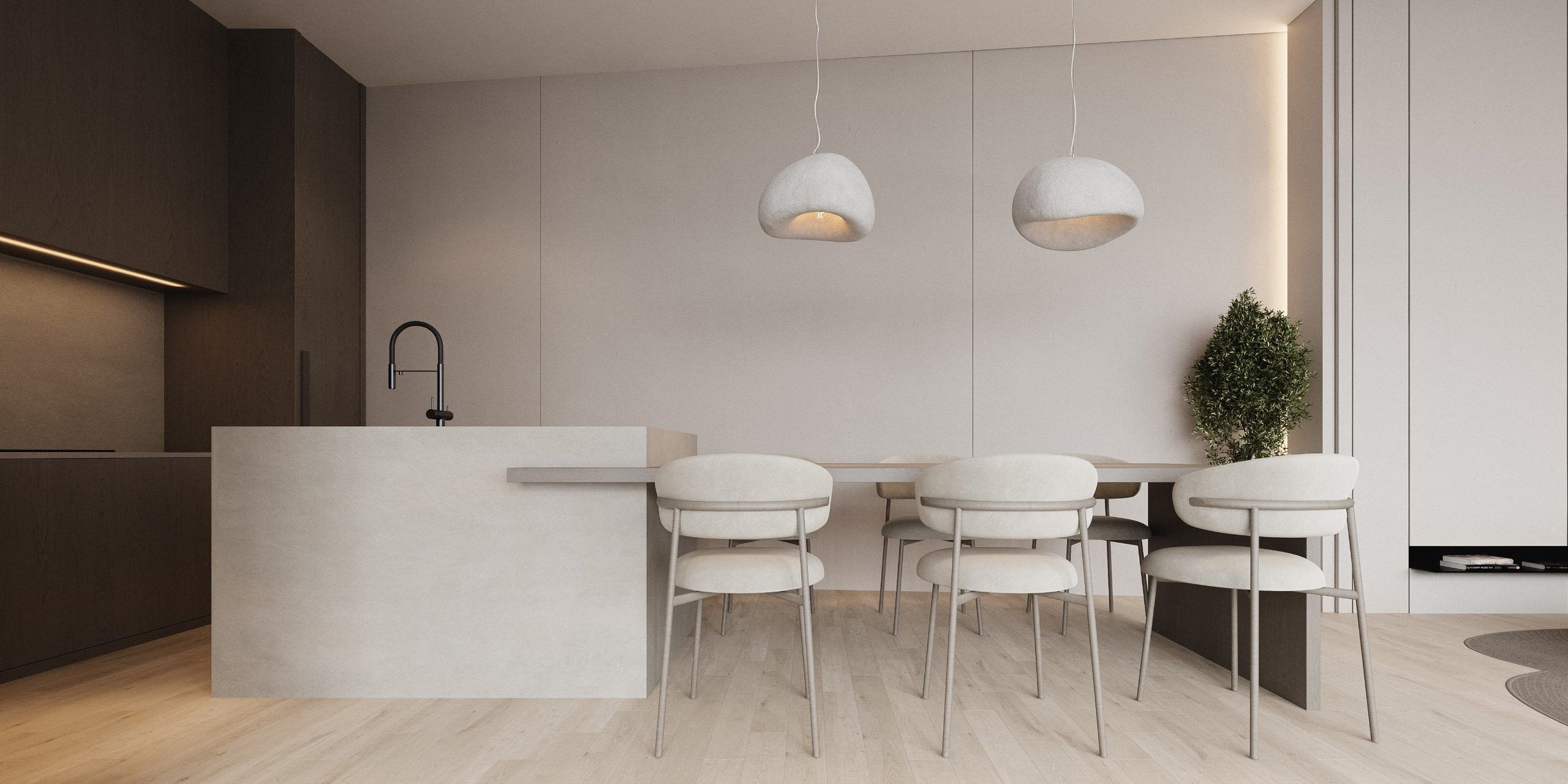 Kitchen-dining area with white island and wooden chairs