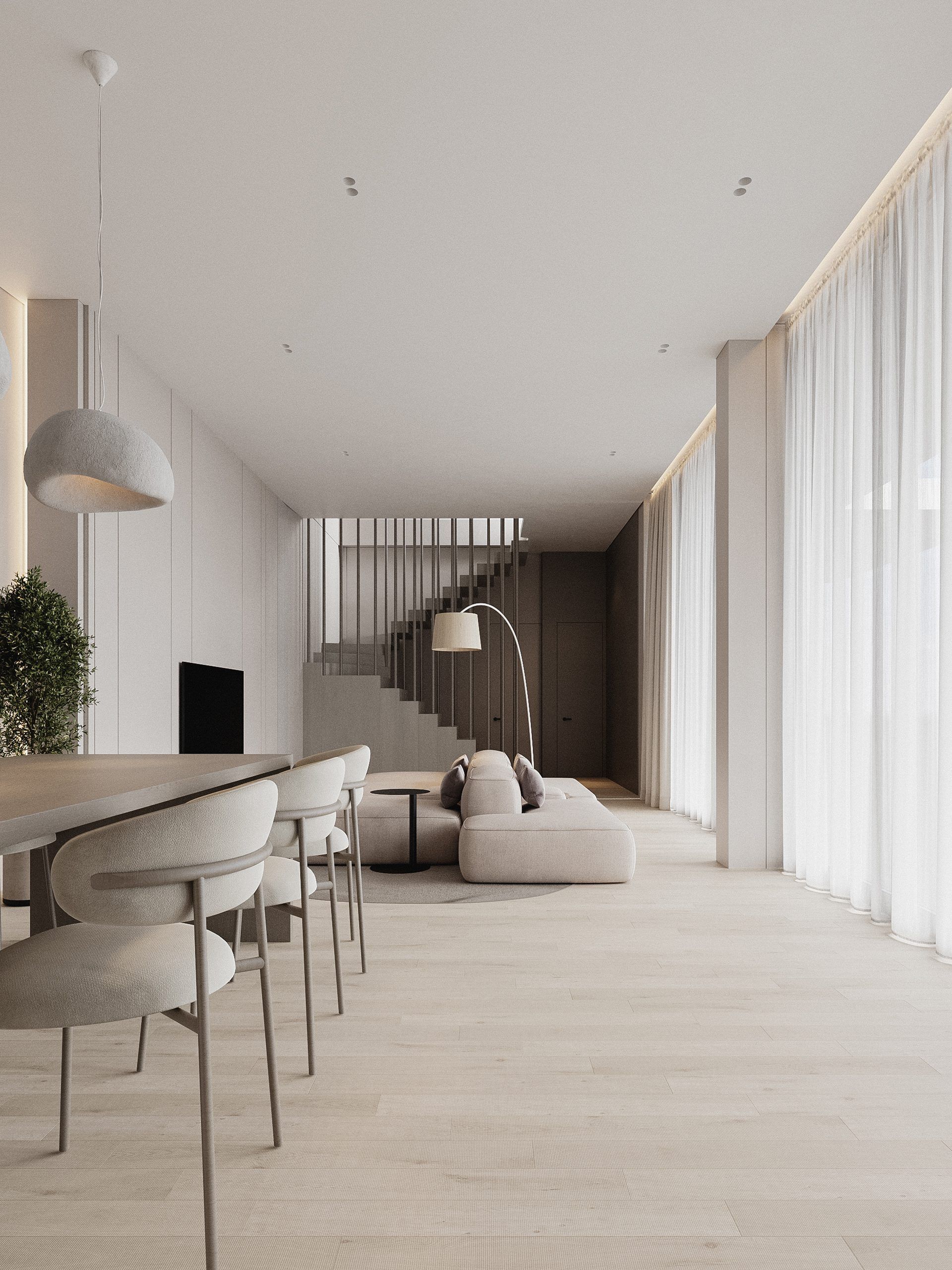 Open plan interior with kitchen, dining and living areas