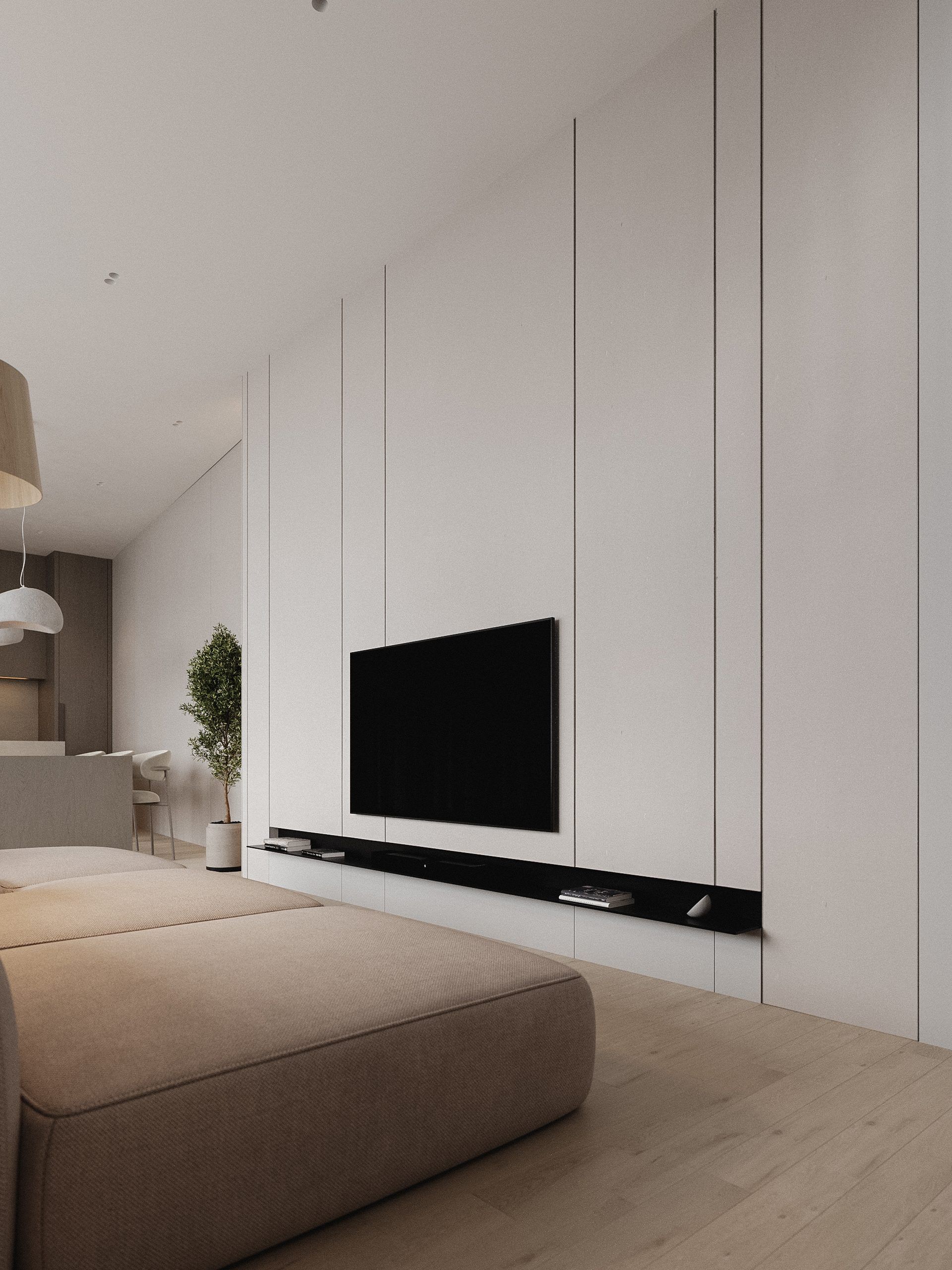 Bedroom with paneled wall and integrated TV