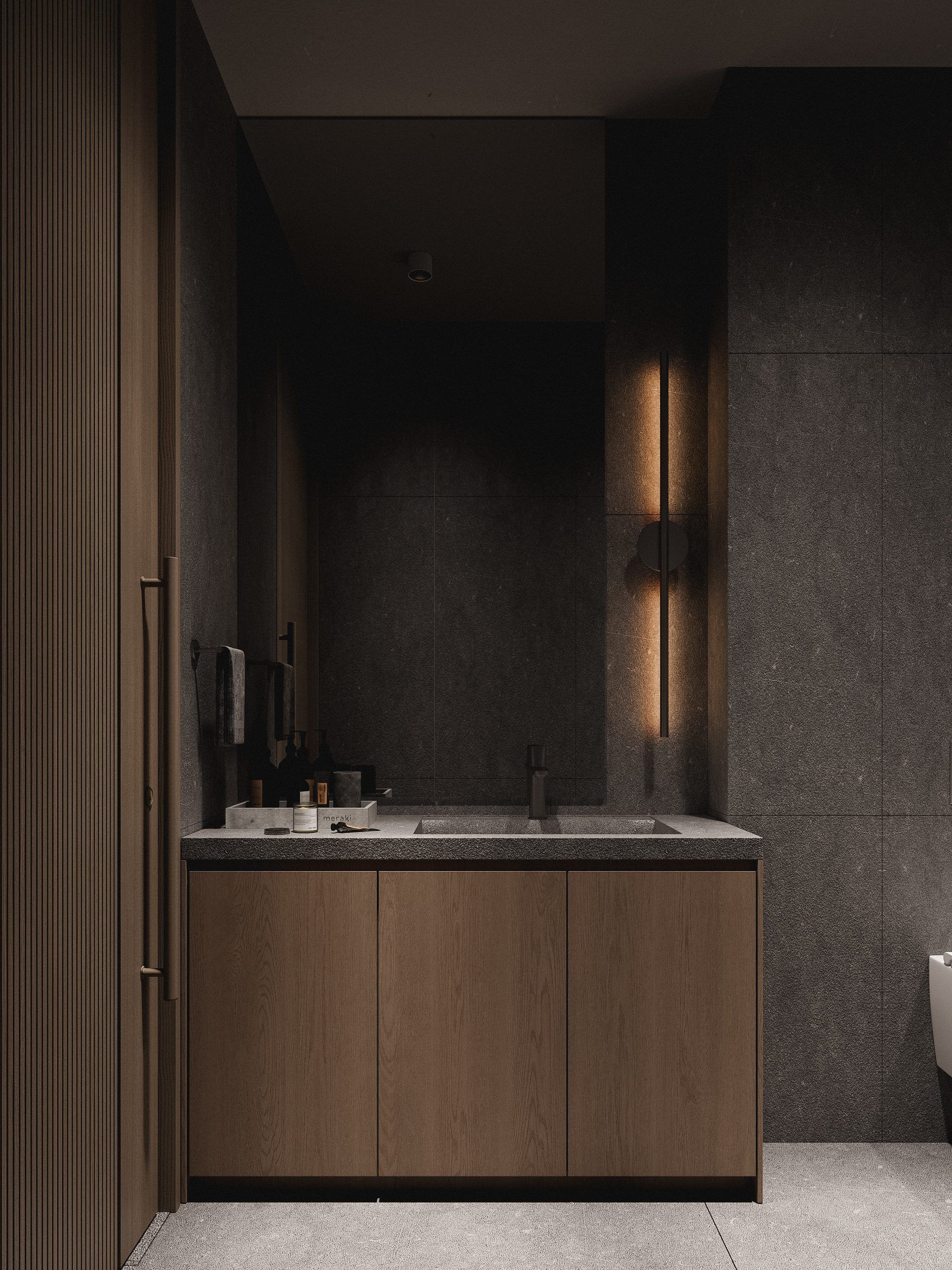 Bathroom with wooden vanity, mirror and warm accent lighting
