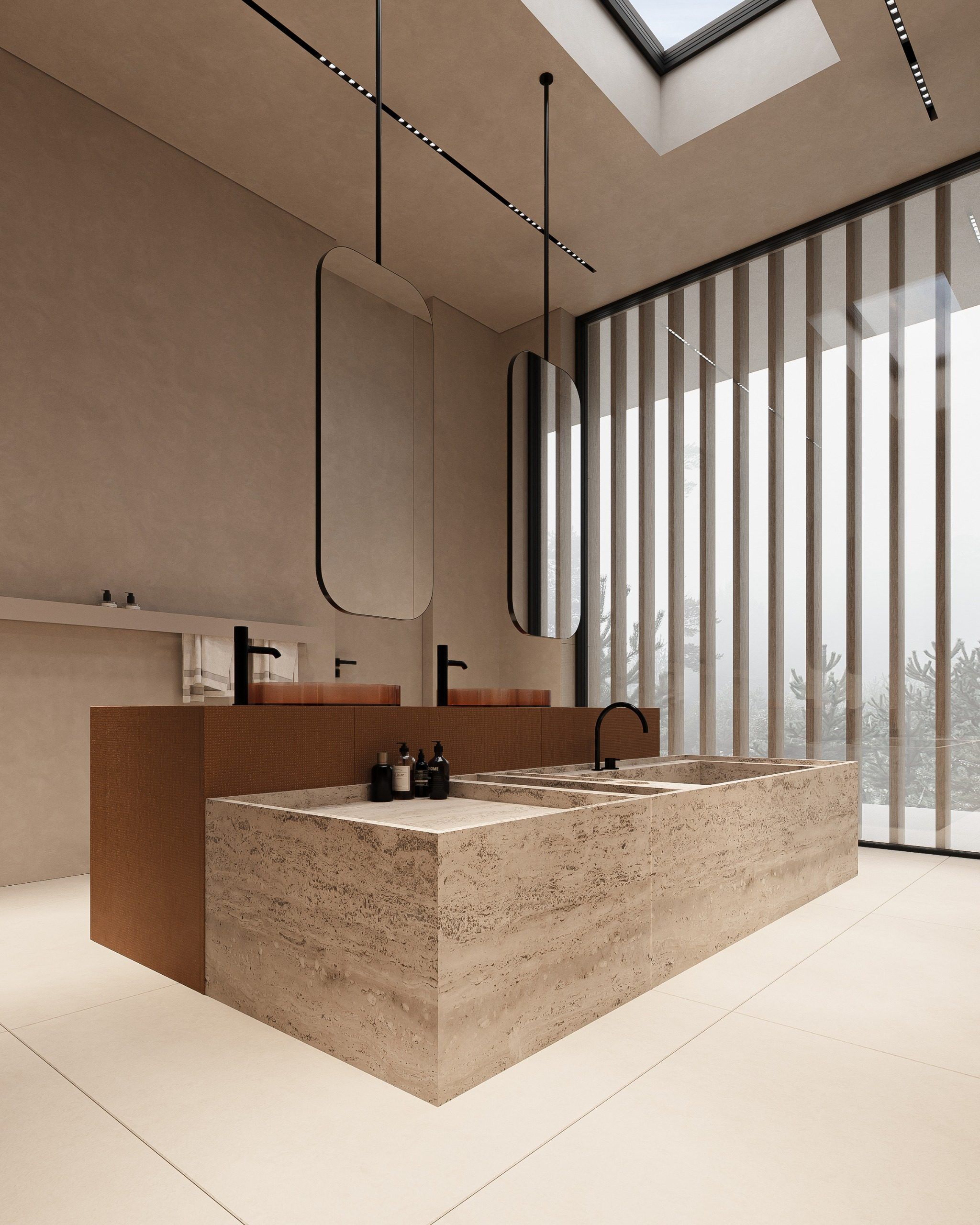 Stone bath with brass faucets and large mirror