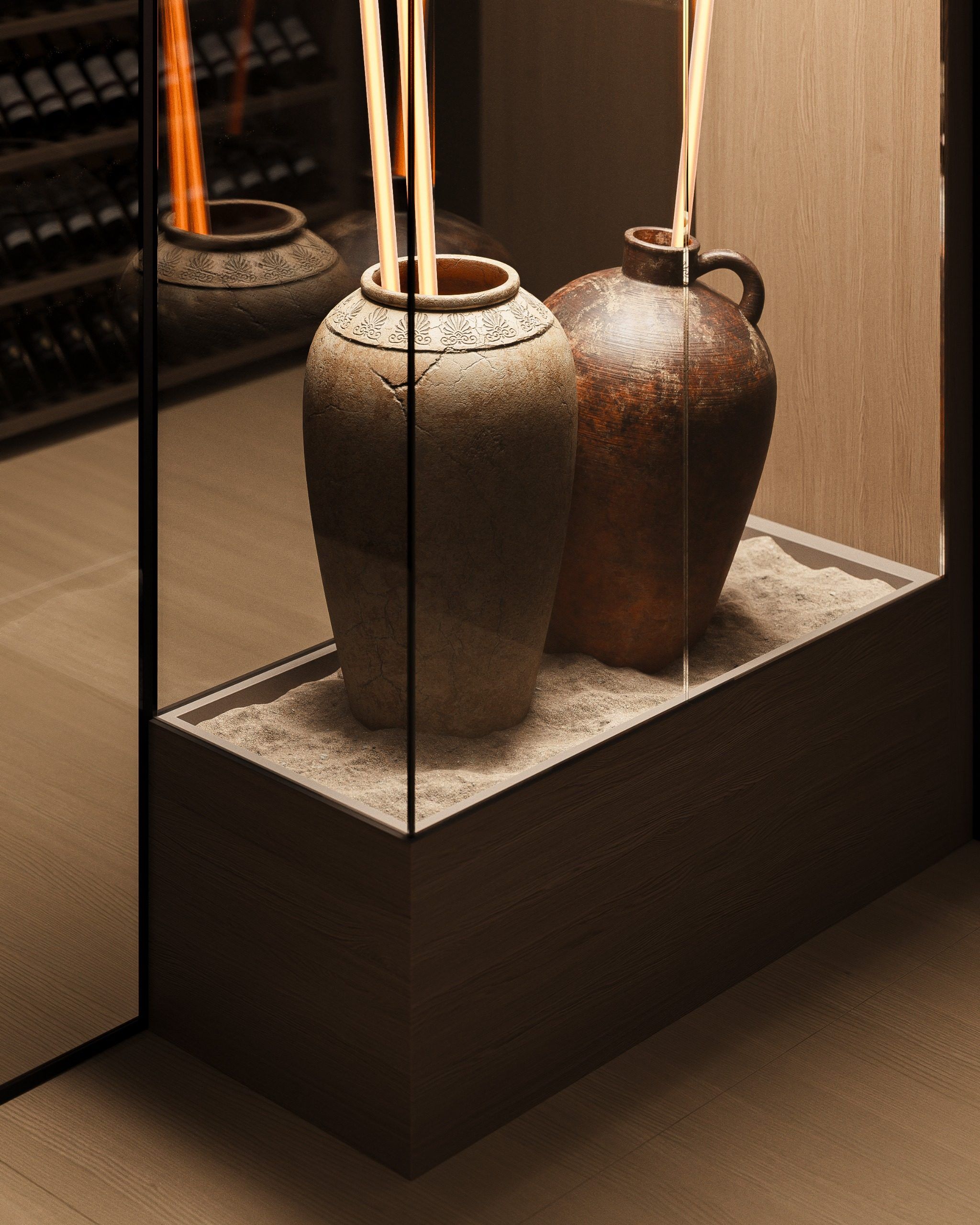 Two ceramic urns in wine room niche with side lighting