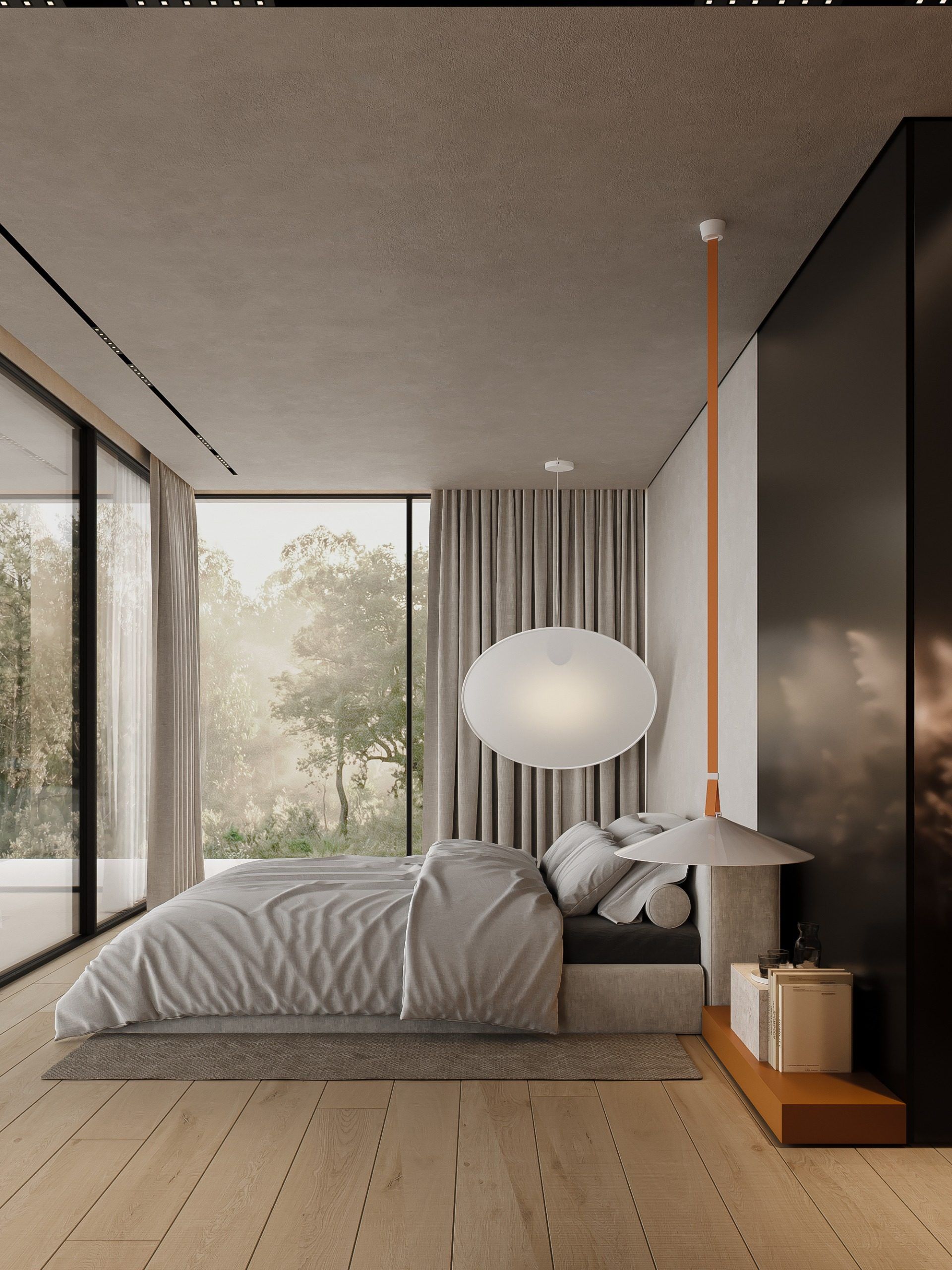 Bedroom with bed, pendant light and garden view through floor-to-ceiling windows