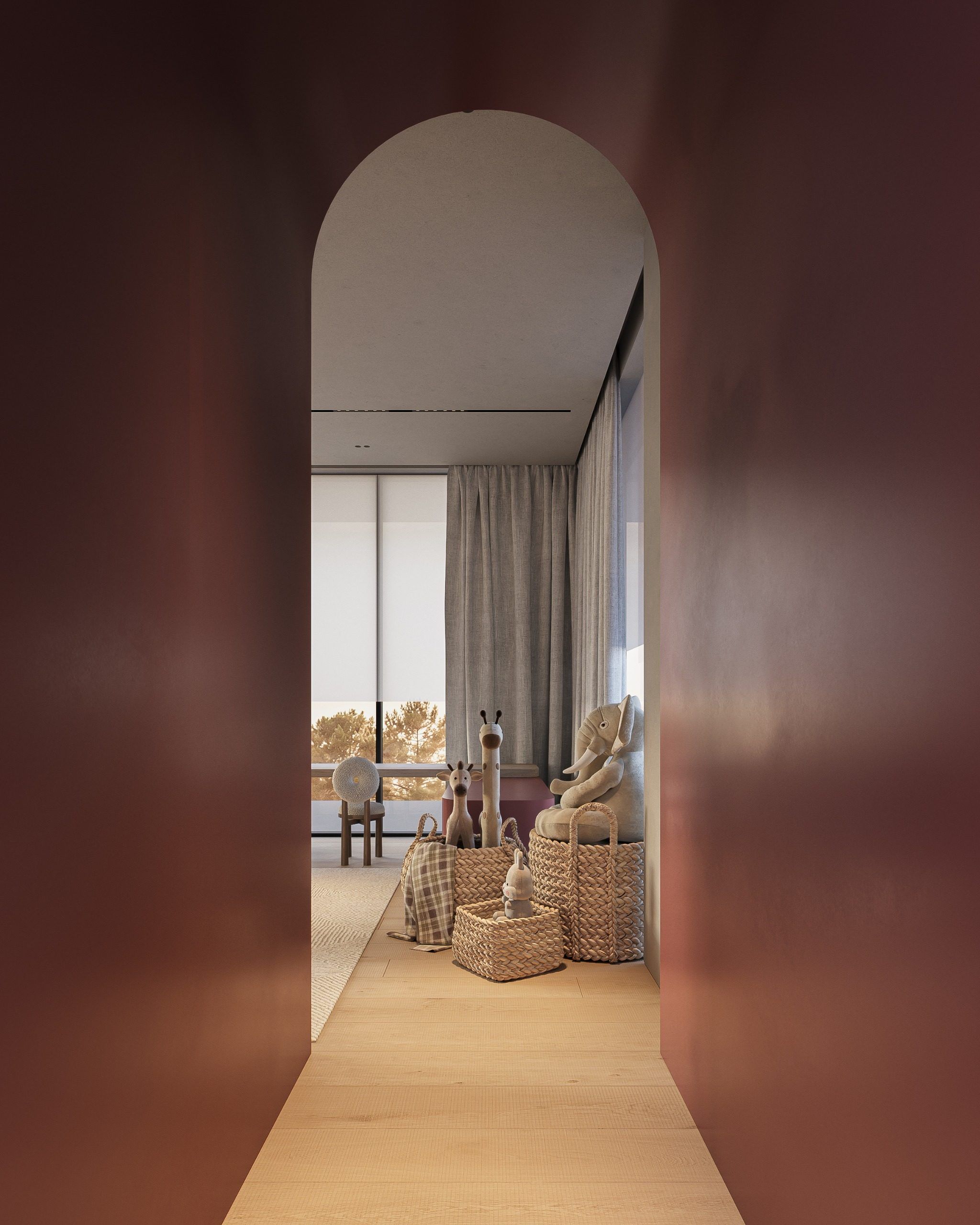 Arched doorway in terracotta wall opening to living area with window and textile accents