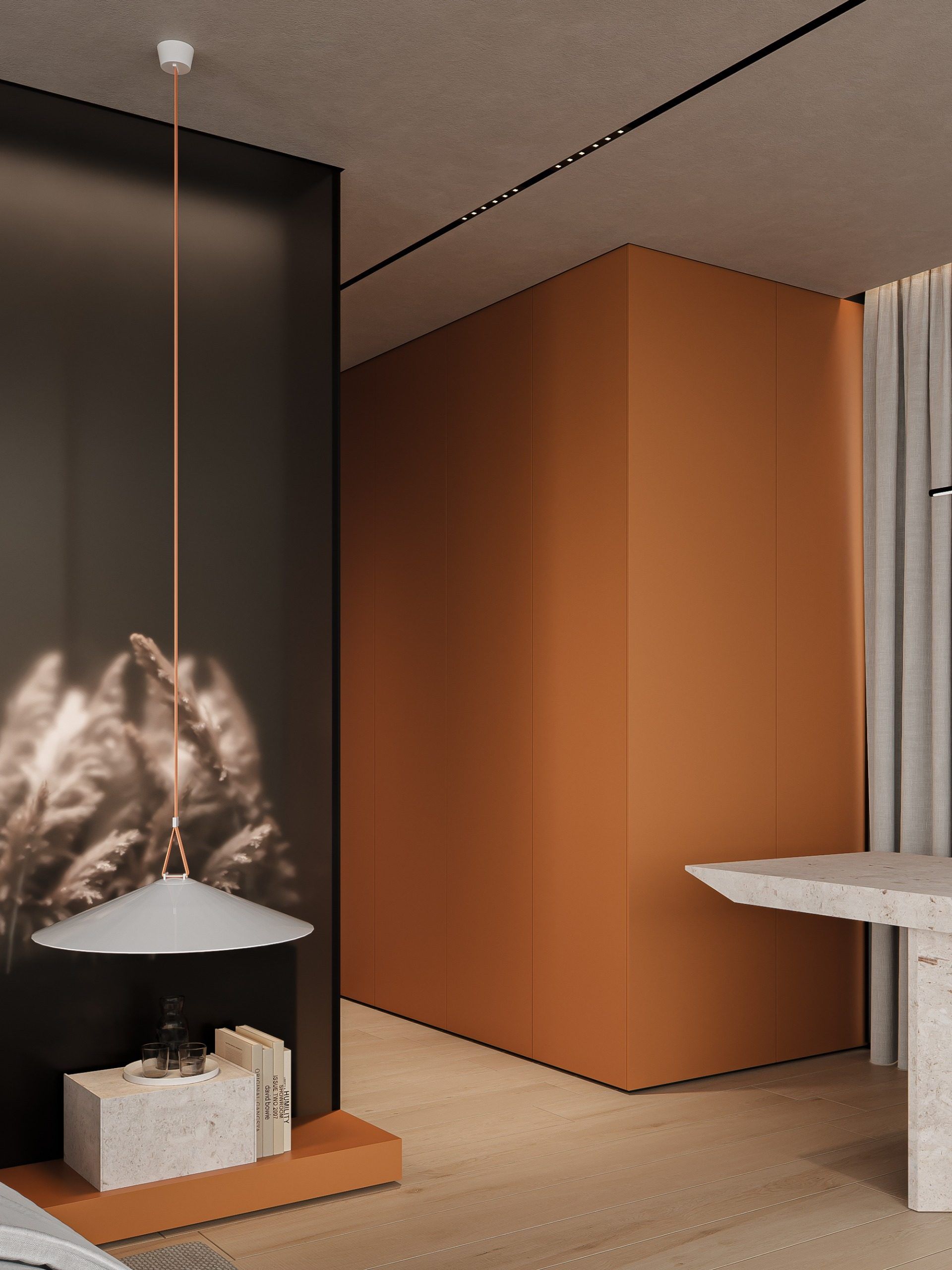 Bedroom with niche displaying dried grasses, pendant light and terracotta accent