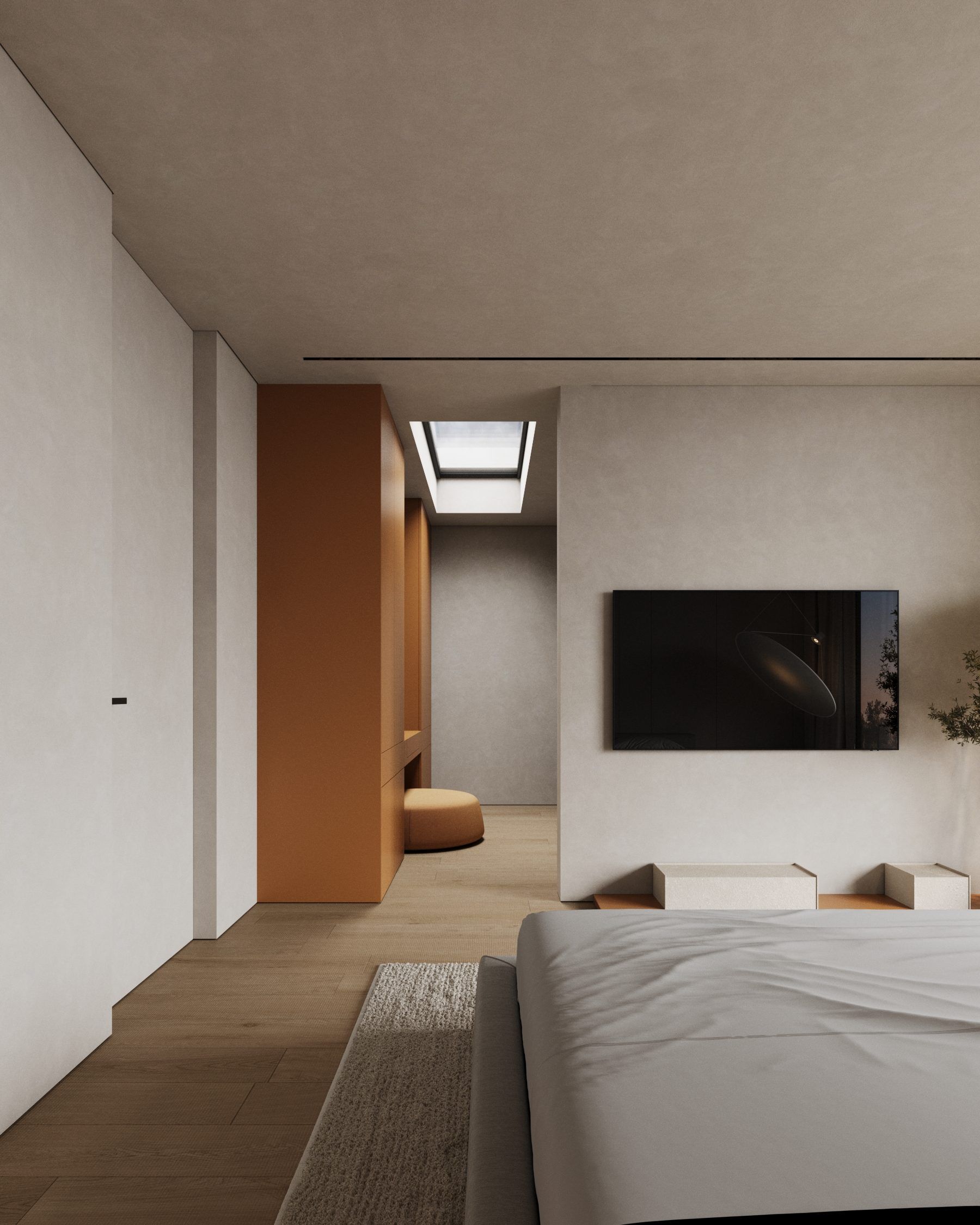 Bedroom with wooden door and built-in wardrobe, view towards bed