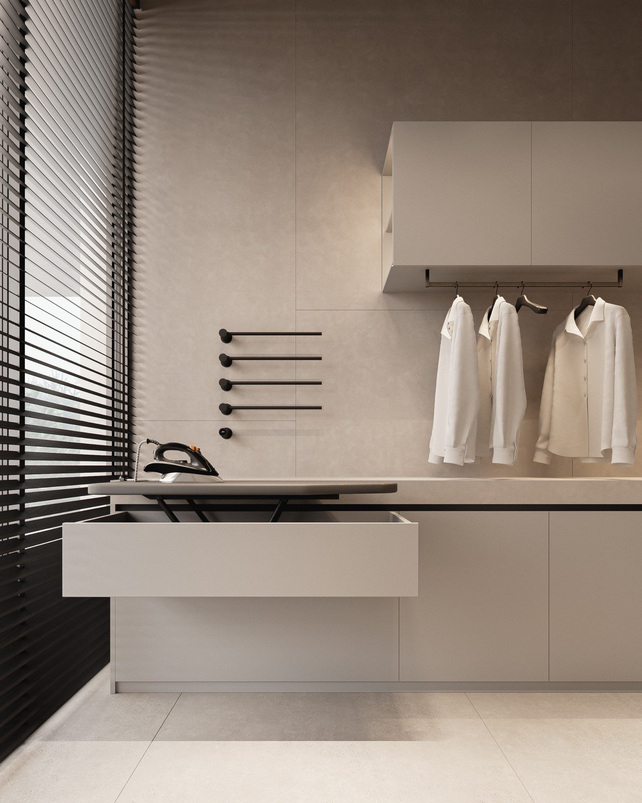 Bathroom with black partition and white towels on floating shelf